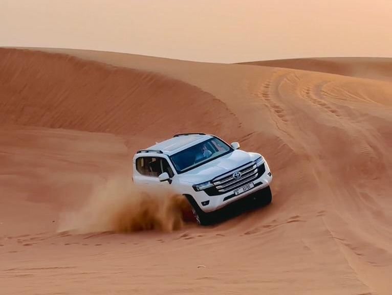 4x4 dune bashing on the red dunes during a Dubai desert safari